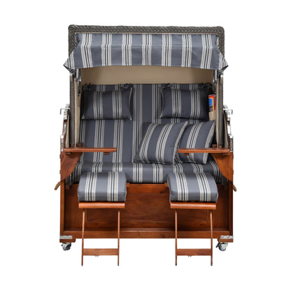 Strandkorb gestreift Vorderansicht. ausgezogene Beinstützen.