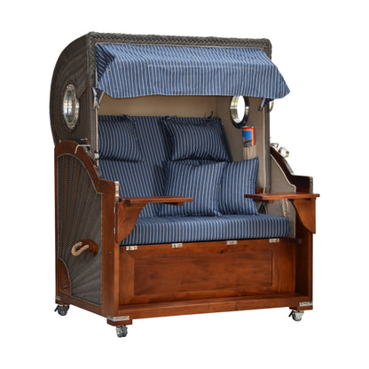 Strandkorb gestreift leicht seitliche Ansicht nach innen geklappte Tische.