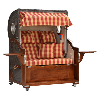 Strandkorb kariert leicht seitliche Ansicht ausgeklappte Tische.